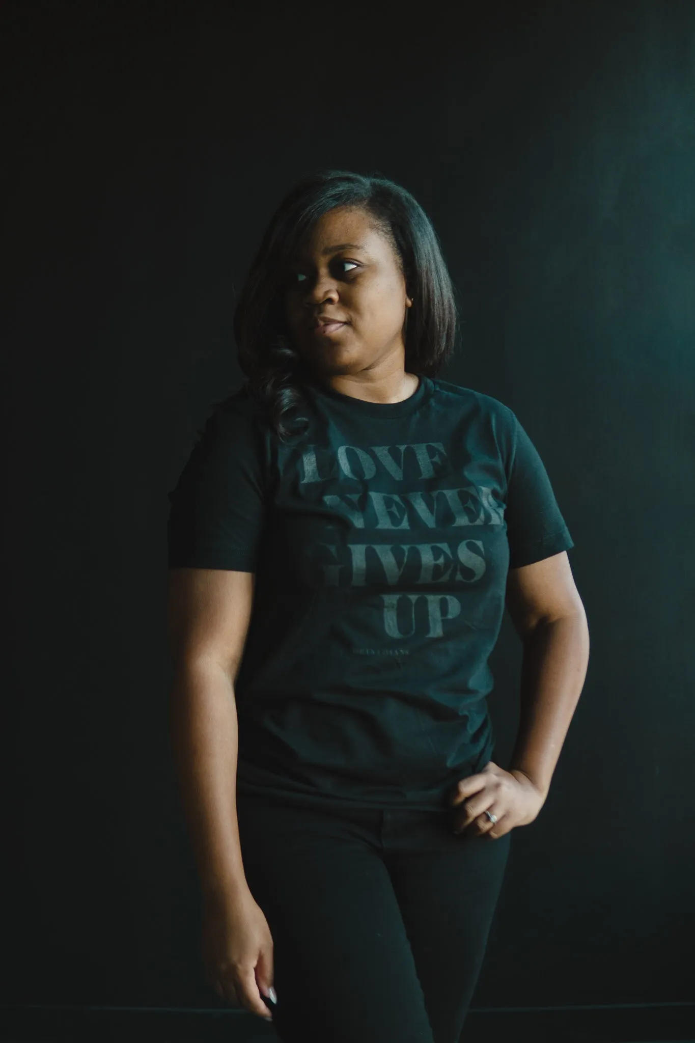 Love Never Gives Up (BLKonBLK) Adult Box T-Shirt