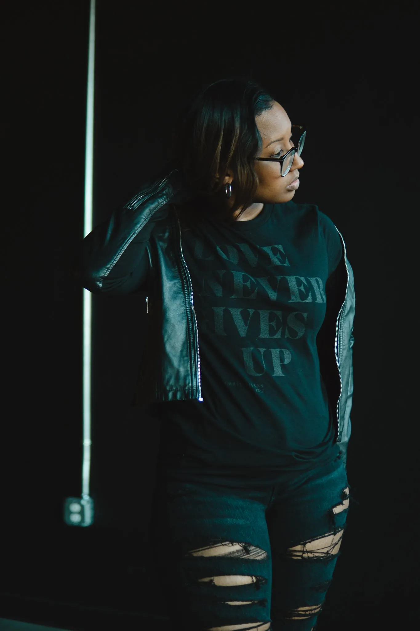 Love Never Gives Up (BLKonBLK) Adult Box T-Shirt