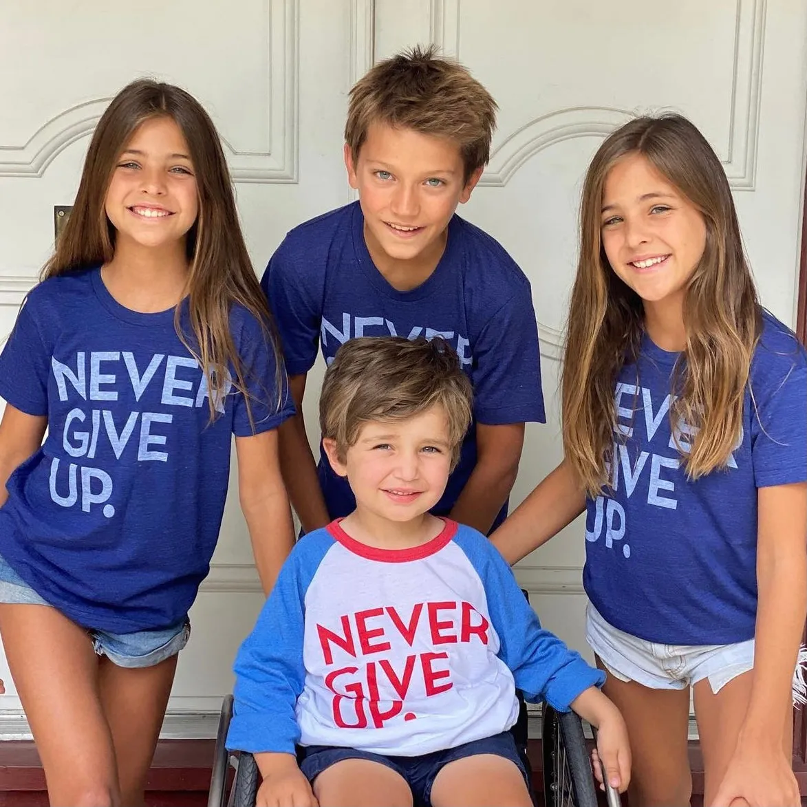ROYAL BLUE SIGNATURE NEVER GIVE UP. TEE